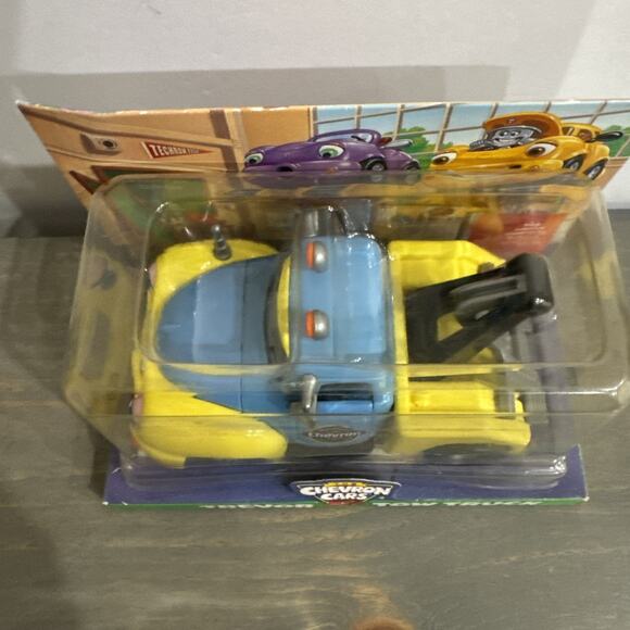 Chevron Cars 2001 Collectible Trevor Tow Truck Vehicle Yellow Blue NEW IN BOX - Picture 2 of 15